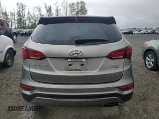 ✅ 2017 Hyundai Santa Fe 2.4L • VIN: 5NMZTDLB6HH002351 • Лот: 52313844. Опубликован ранее на Copart с пробегом Не указан. Бесплатный доступ к архиву аукционных продаж из США и подробный отчёт об истории автомобиля на DreamBid. Изображение 6.