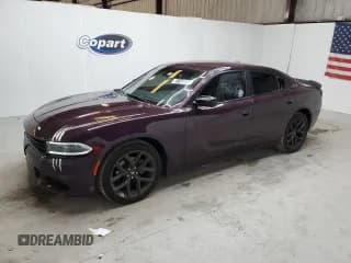 ✅ 2022 Dodge Charger SXT • VIN: 2C3CDXBGXNH183421 • Lot: 81145085. Listed on Copart with 96,815 mi. Free auction sales archive from the USA and detailed vehicle history report at DreamBid. Image 1.