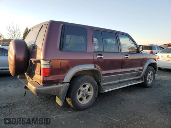 ✅ 2001 Isuzu Trooper S • VIN: JACDJ58X817J17877 • Lot: 41788875. Listed on Copart with 203,199 mi. Free auction sales archive from the USA and detailed vehicle history report at DreamBid. Image 3.