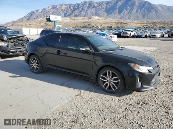 ✅ 2014 Scion tC • VIN: JTKJF5C70E3069794 • Лот: 91470825. Опубликован ранее на Copart с пробегом 197 498 миль. Бесплатный доступ к архиву аукционных продаж из США и подробный отчёт об истории автомобиля на DreamBid. Изображение 4.