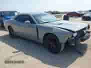 2012 Dodge Challenger SXT Plus z VIN 2C3CDYAG8CH176729, wystawiony jako IAAI lot #43219864 z przebiegiem 165 076 mil mil oraz . Historia ofert i sprzedaży dostępna na DreamBid. Obrazek 1.