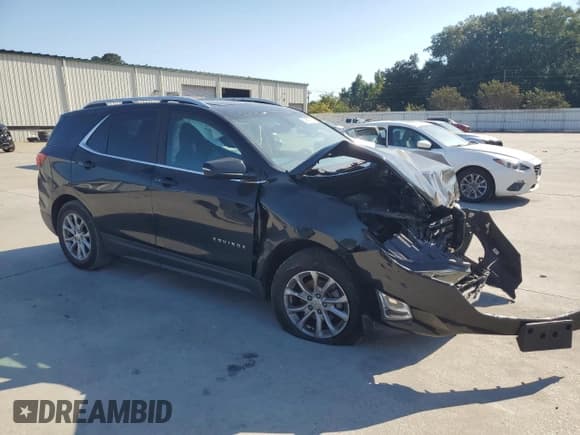✅ 2018 Chevrolet Equinox LT • VIN: 2GNAXSEV7J6255177 • Lot: 83867775. Listed on Copart with 79,779 mi. Free auction sales archive from the USA and detailed vehicle history report at DreamBid. Image 4.