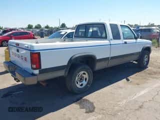 1994 Dodge Dakota z VIN 1B7GG23Y1RS589178, wystawiony jako IAAI lot #42731554 z przebiegiem 162 203 mil mil oraz . Historia ofert i sprzedaży dostępna na DreamBid. Obrazek 4.