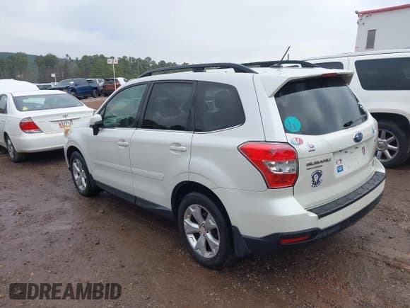 ✅ 2014 Subaru Forester Touring • VIN: JF2SJAPC5EH425252 • Lot: 43847572. Listed on IAAI with 213,349 mi. Free auction sales archive from the USA and detailed vehicle history report at DreamBid. Image 3.