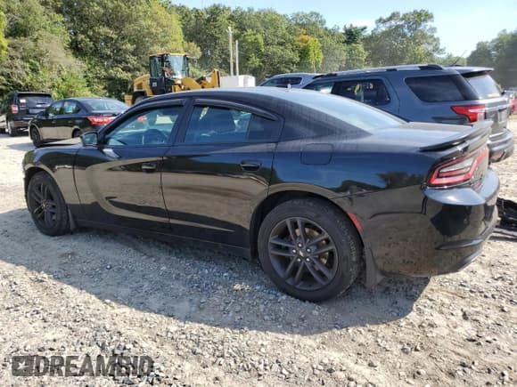 ✅ 2019 Dodge Charger SXT • VIN: 2C3CDXJG0KH523656 • Lot: 71953465. Listed on Copart with 130,265 mi. Free auction sales archive from the USA and detailed vehicle history report at DreamBid. Image 2.