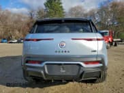 ✅ 2023 Fisker Ocean One • VIN: VCF1ZBU21PG004710 • Lot: 93504935. Listed on Copart with 12,437 mi. Free auction sales archive from the USA and detailed vehicle history report at DreamBid. Image 6.