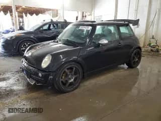 2003 MINI Hardtop with VIN WMWRC33473TC40874, listed as a Copart auction lot 63244255 with 266,186 mi miles and Salvage title. Bid and sale history available at DreamBid. Image 1.