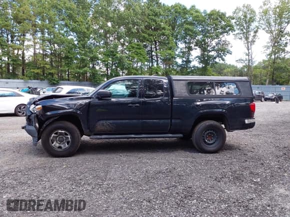 ✅ 2020 Toyota Tacoma SR • VIN: 3TYSX5ENXLT001202 • Lot: 42781126. Listed on IAAI with 250,016 mi. Free auction sales archive from the USA and detailed vehicle history report at DreamBid. Image 14.