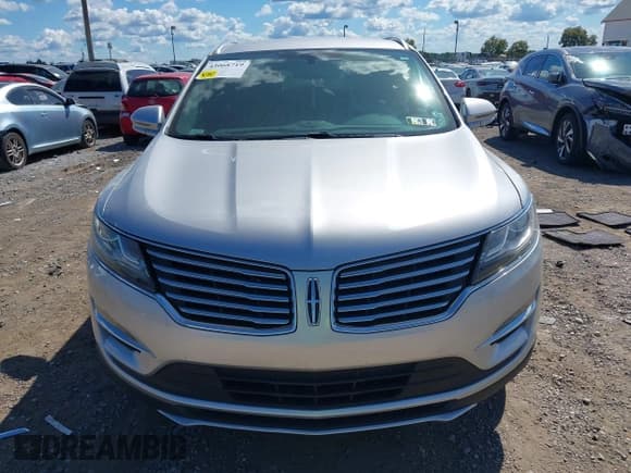 ✅ 2015 Lincoln MKC • VIN: 5LMCJ2A91FUJ19723 • Lot: 43068719. Listed on IAAI with 64,541 mi. Free auction sales archive from the USA and detailed vehicle history report at DreamBid. Image 12.
