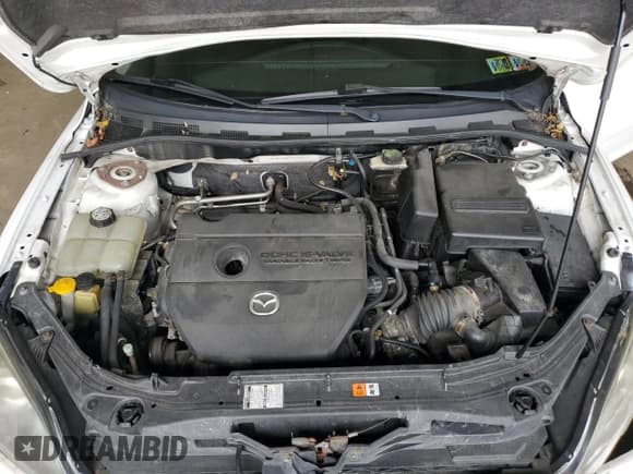 ✅ 2007 Mazda 3 S Touring • VIN: JM1BK344371645571 • Lot: 65622425. Wystawiony na Copart z przebiegiem Nie podano. Bezpłatny archiwum sprzedaży aukcyjnych z USA i szczegółowy raport historii pojazdu na DreamBid. Zdjęcie 11.