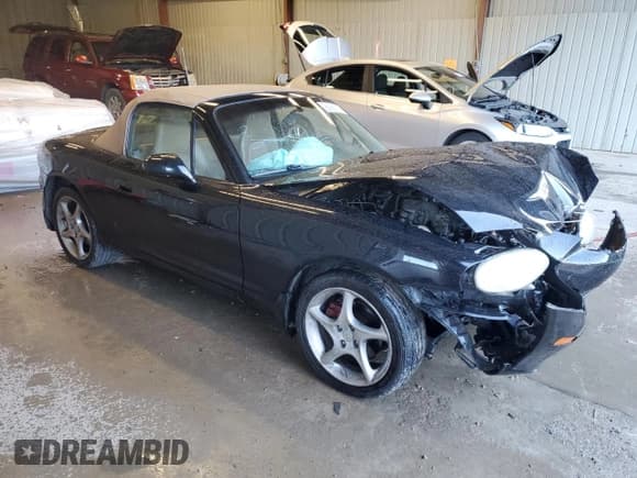 ✅ 2001 Mazda MX-5 Miata • VIN: JM1NB353610214500 • Lot: 92922135. Listed on Copart with 159,823 mi. Free auction sales archive from the USA and detailed vehicle history report at DreamBid. Image 4.