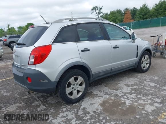 ✅ 2013 Chevrolet Captiva Sport LS • VIN: 3GNAL2EKXDS606686 • Lot: 42186441. Wystawiony na IAAI z przebiegiem 129 815 mil. Bezpłatny archiwum sprzedaży aukcyjnych z USA i szczegółowy raport historii pojazdu na DreamBid. Zdjęcie 4.