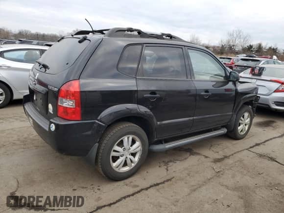 2009 Hyundai Tucson GLS z VIN KM8JM12B79U042549, wystawiony jako Copart lot #87487604 z przebiegiem 112 724 mil mil oraz Szkoda całkowita • Salvage title. Historia ofert i sprzedaży dostępna na DreamBid. Obrazek 3.