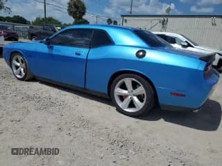✅ 2010 Dodge Challenger SRT-8 • VIN: 2B3CJ7DW2AH131799 • Lot: 67161674. Wystawiony na Copart z przebiegiem 92 623 mil. Bezpłatny archiwum sprzedaży aukcyjnych z USA i szczegółowy raport historii pojazdu na DreamBid. Zdjęcie 2.