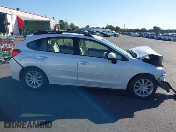 ✅ 2012 Subaru Impreza Premium • VIN: JF1GPAB61CH240431 • Lot: 43315187. Listed on IAAI with 76,218 mi. Free auction sales archive from the USA and detailed vehicle history report at DreamBid. Image 13.