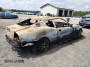 ✅ 2006 Maserati Coupe • VIN: ZAMBC38A460024627 • Lot: 69426374. Listed on Copart with Not provided. Free auction sales archive from the USA and detailed vehicle history report at DreamBid. Image 3.