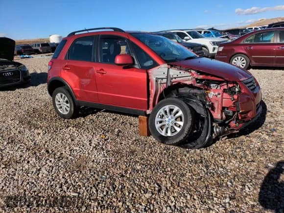 ✅ 2013 Suzuki SX4 Crossover • VIN: JS2YB5A36D6100468 • Лот: 81133544. Опубликован ранее на Copart с пробегом 56 816 миль. Бесплатный доступ к архиву аукционных продаж из США и подробный отчёт об истории автомобиля на DreamBid. Изображение 14.