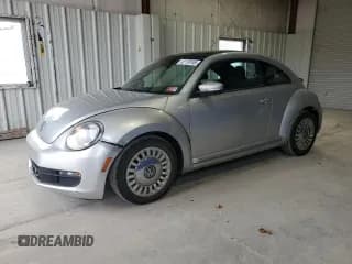 ✅ 2014 Volkswagen Beetle 2.5L • VIN: 3VWJX7ATXEM614430 • Lot: 92179165. Listed on Copart with 169,965 mi. Free auction sales archive from the USA and detailed vehicle history report at DreamBid. Image 1.