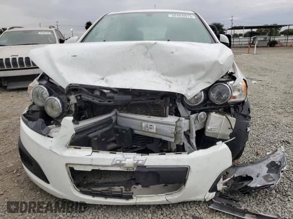 ✅ 2014 Chevrolet Sonic LS • VIN: 1G1JA6SGXE4197654 • Lot: 92868875. Listed on Copart with 115,903 mi. Free auction sales archive from the USA and detailed vehicle history report at DreamBid. Image 5.