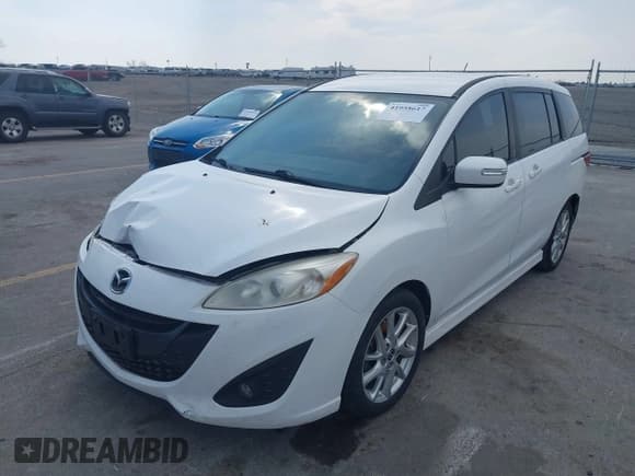 ✅ 2013 Mazda 5 Touring • VIN: JM1CW2CL7D0149735 • Lot: 41958617. Listed on IAAI with 120,488 mi. Free auction sales archive from the USA and detailed vehicle history report at DreamBid. Image 2.