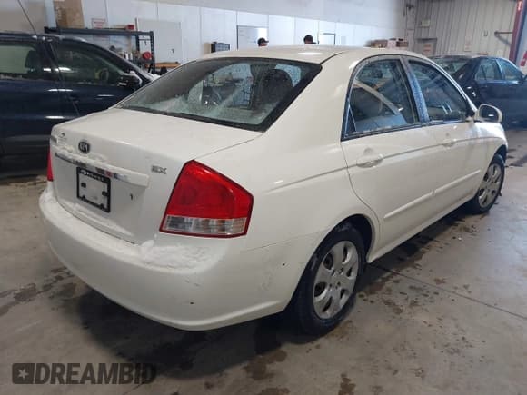 ✅ 2009 Kia Spectra EX • VIN: KNAFE221795662135 • Lot: 43847748. Listed on IAAI with 99,869 mi. Free auction sales archive from the USA and detailed vehicle history report at DreamBid. Image 4.