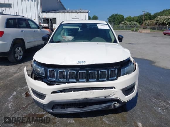 ✅ 2018 Jeep Compass Sport • VIN: 3C4NJCAB8JT151712 • Lot: 42980105. Listed on IAAI with 144,114 mi. Free auction sales archive from the USA and detailed vehicle history report at DreamBid. Image 12.