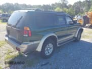 ✅ 2000 Mitsubishi Montero Sport LS • VIN: JA4LS31H0YP055199 • Lot: 41990427. Listed on IAAI with 162,687 mi. Free auction sales archive from the USA and detailed vehicle history report at DreamBid. Image 4.