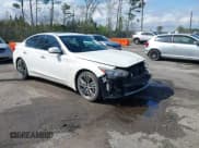 ✅ 2015 Infiniti Q50 Premium • VIN: JN1BV7APXFM331963 • Lot: 41743215. Listed on IAAI with 142,489 mi. Free auction sales archive from the USA and detailed vehicle history report at DreamBid. Image 1.