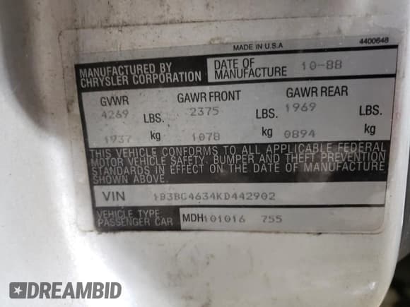 ✅ 1989 Dodge Dynasty • VIN: 1B3BC4634KD442902 • Lot: 85151394. Listed on Copart with 63,120 mi. Free auction sales archive from the USA and detailed vehicle history report at DreamBid. Image 12.