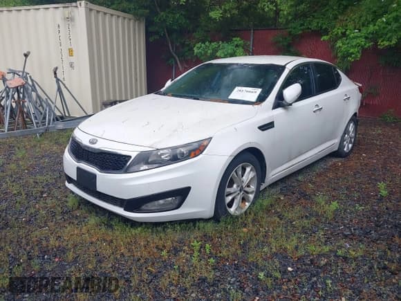 ✅ 2011 Kia Optima EX • VIN: KNAGN4A65B5143331 • Lot: 28176669. Listed on IAAI with 162,919 mi. Free auction sales archive from the USA and detailed vehicle history report at DreamBid. Image 16.