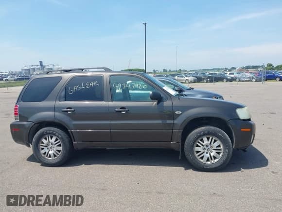 ✅ 2005 Mercury Mariner Luxury • VIN: 4M2CU571X5DJ03210 • Lot: 42747920. Listed on IAAI with 167,795 mi. Free auction sales archive from the USA and detailed vehicle history report at DreamBid. Image 12.