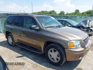 ✅ 2003 GMC Envoy SLE • VIN: 1GKDS13S932374683 • Лот: 42710103. Опубликован ранее на IAAI с пробегом 61 815 миль. Бесплатный доступ к архиву аукционных продаж из США и подробный отчёт об истории автомобиля на DreamBid. Изображение 1.