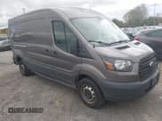 ✅ 2015 Ford Transit Cargo • VIN: 1FTNR2CM1FKB25334 • Lot: 43527517. Listed on IAAI with 178,023 mi. Free auction sales archive from the USA and detailed vehicle history report at DreamBid. Image 1.