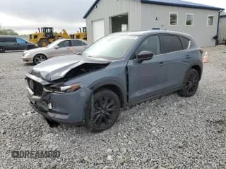 ✅ 2021 Mazda CX-5 Carbon Edition • VIN: JM3KFACY8M0392236 • Lot: 58767455. Listed on Copart with 32,040 mi. Free auction sales archive from the USA and detailed vehicle history report at DreamBid. Image 1.