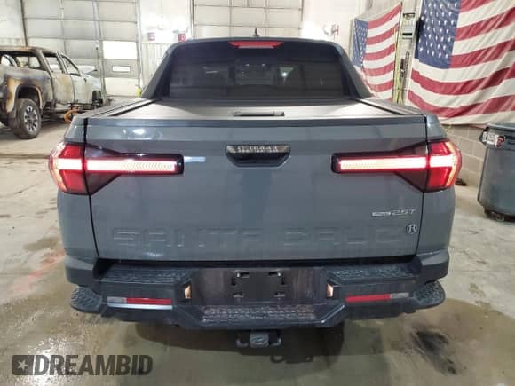 2023 Hyundai Santa Cruz Night Edition с VIN 5NTJCDAF6PH050812, выставлен на аукционе Copart как лот 85301874 с пробегом 42 677 миль миль и Списание • Salvage title. История ставок и продаж доступна на DreamBid. Изображение 6.