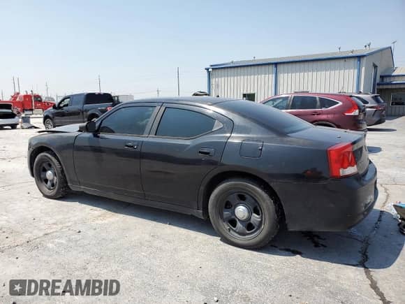 2009 Dodge Charger Police с VIN 2B3KA43T49H536981, выставлен на аукционе Copart как лот 54721694 с пробегом 160 508 миль миль и Списание • Salvage title. История ставок и продаж доступна на DreamBid. Изображение 2.