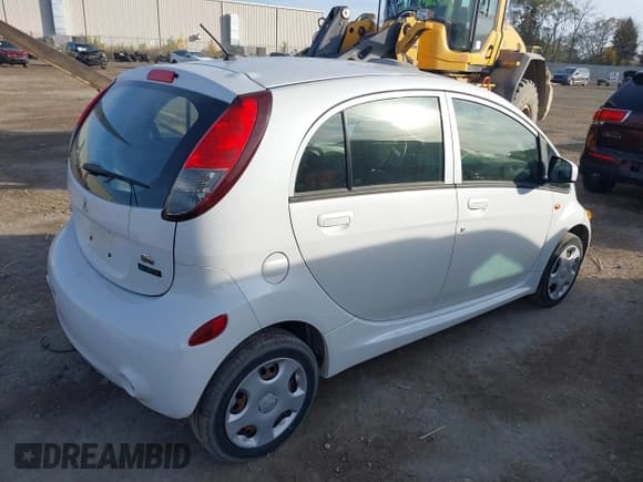 ✅ 2012 Mitsubishi i-MiEV ES • VIN: JA3215H11CU028529 • Lot: 40710323. Listed on IAAI with 81,421 mi. Free auction sales archive from the USA and detailed vehicle history report at DreamBid. Image 4.