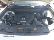 ✅ 2021 Mazda CX-9 Touring • VIN: JM3TCBCYXM0521323 • Lot: 42190976. Listed on IAAI with 56,652 mi. Free auction sales archive from the USA and detailed vehicle history report at DreamBid. Image 10.