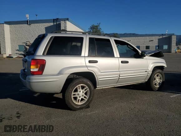 2004 Jeep Grand Cherokee Laredo с VIN 1J4GX48S54C385240, выставлен на аукционе Copart как лот 86716575 с пробегом 131 190 миль миль и Списание • Salvage title. История ставок и продаж доступна на DreamBid. Изображение 3.