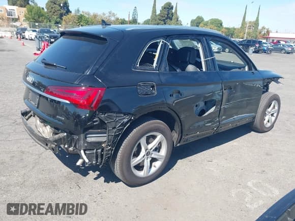 ✅ 2023 Audi Q5 Premium • VIN: WA1ABAFY6P2097554 • Лот: 43296004. Опубликован ранее на IAAI с пробегом 12 780 миль. Бесплатный доступ к архиву аукционных продаж из США и подробный отчёт об истории автомобиля на DreamBid. Изображение 4.