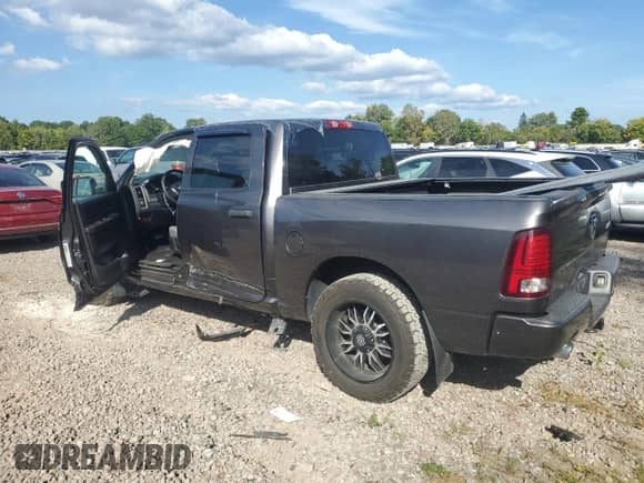 2016 Ram 1500 Express with VIN 3C6RR7KT2GG163629, listed as a Copart auction lot 70917385 with 75,334 mi miles and Salvage title. Bid and sale history available at DreamBid. Image 2.