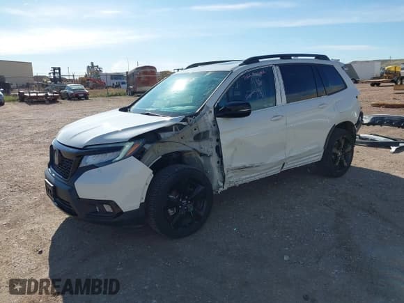 ✅ 2019 Honda Passport Elite • VIN: 5FNYF8H0XKB001472 • Лот: 42143890. Опубликован ранее на IAAI с пробегом 98 119 миль. Бесплатный доступ к архиву аукционных продаж из США и подробный отчёт об истории автомобиля на DreamBid. Изображение 2.
