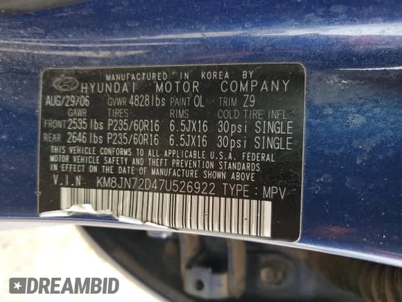 2007 Hyundai Tucson SE with VIN KM8JN72D47U526922, listed as a Copart auction lot 58834145 with 191,302 mi miles and Salvage title. Bid and sale history available at DreamBid. Image 13.