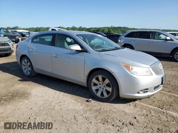 ✅ 2012 Buick LaCrosse Leather • VIN: 1G4GC5E32CF343511 • Lot: 58705155. Listed on Copart with 197,496 mi. Free auction sales archive from the USA and detailed vehicle history report at DreamBid. Image 4.