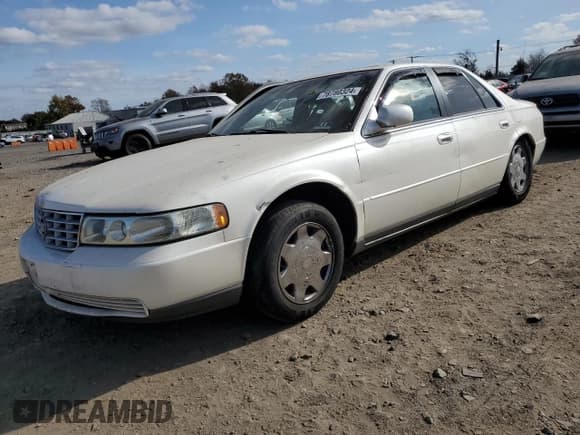 ✅ 1998 Cadillac Seville SLS • VIN: 1G6KS54Y3WU921519 • Lot: 80199104. Listed on Copart with 110,726 mi. Free auction sales archive from the USA and detailed vehicle history report at DreamBid. Image 1.