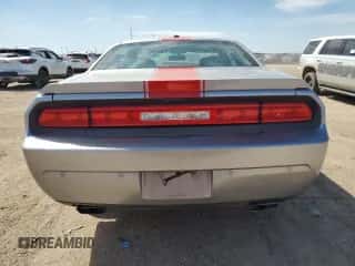 2014 Dodge Challenger SXT z VIN 2C3CDYAG0EH139872, wystawiony jako Copart lot #68122374 z przebiegiem 113 207 mil mil oraz Szkoda całkowita • Salvage title. Historia ofert i sprzedaży dostępna na DreamBid. Obrazek 6.