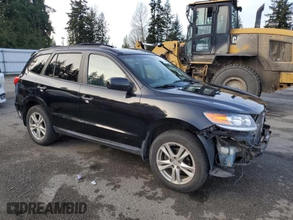 ✅ 2012 Hyundai Santa Fe Limited • VIN: 5XYZKDAG4CG163883 • Lot: 88688995. Listed on Copart with 82,116 mi. Free auction sales archive from the USA and detailed vehicle history report at DreamBid. Image 4.