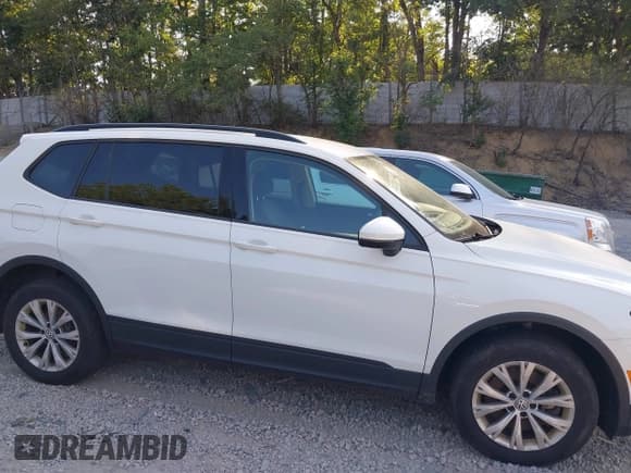✅ 2018 Volkswagen Tiguan S • VIN: 3VV0B7AX6JM119959 • Lot: 42967527. Listed on IAAI with 140,935 mi. Free auction sales archive from the USA and detailed vehicle history report at DreamBid. Image 13.