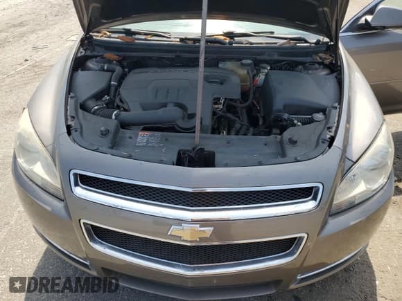 ✅ 2012 Chevrolet Malibu 1LT • VIN: 1G1ZC5E07CF329020 • Lot: 59535484. Listed on Copart with 169,201 mi. Free auction sales archive from the USA and detailed vehicle history report at DreamBid. Image 12.