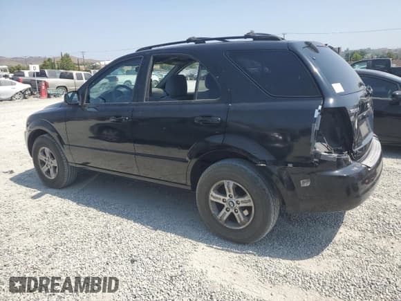 ✅ 2003 Kia Sorento LX • VIN: KNDJD733235173825 • Лот: 62675685. Опубликован ранее на Copart с пробегом 150 760 миль. Бесплатный доступ к архиву аукционных продаж из США и подробный отчёт об истории автомобиля на DreamBid. Изображение 2.